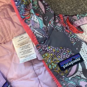Patagonia Reversible Snowsuit. Size 3-6 month. Barely used, great condition.